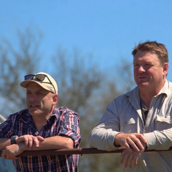 Up For Bids founder with cattle, representing livestock-based lending alternative